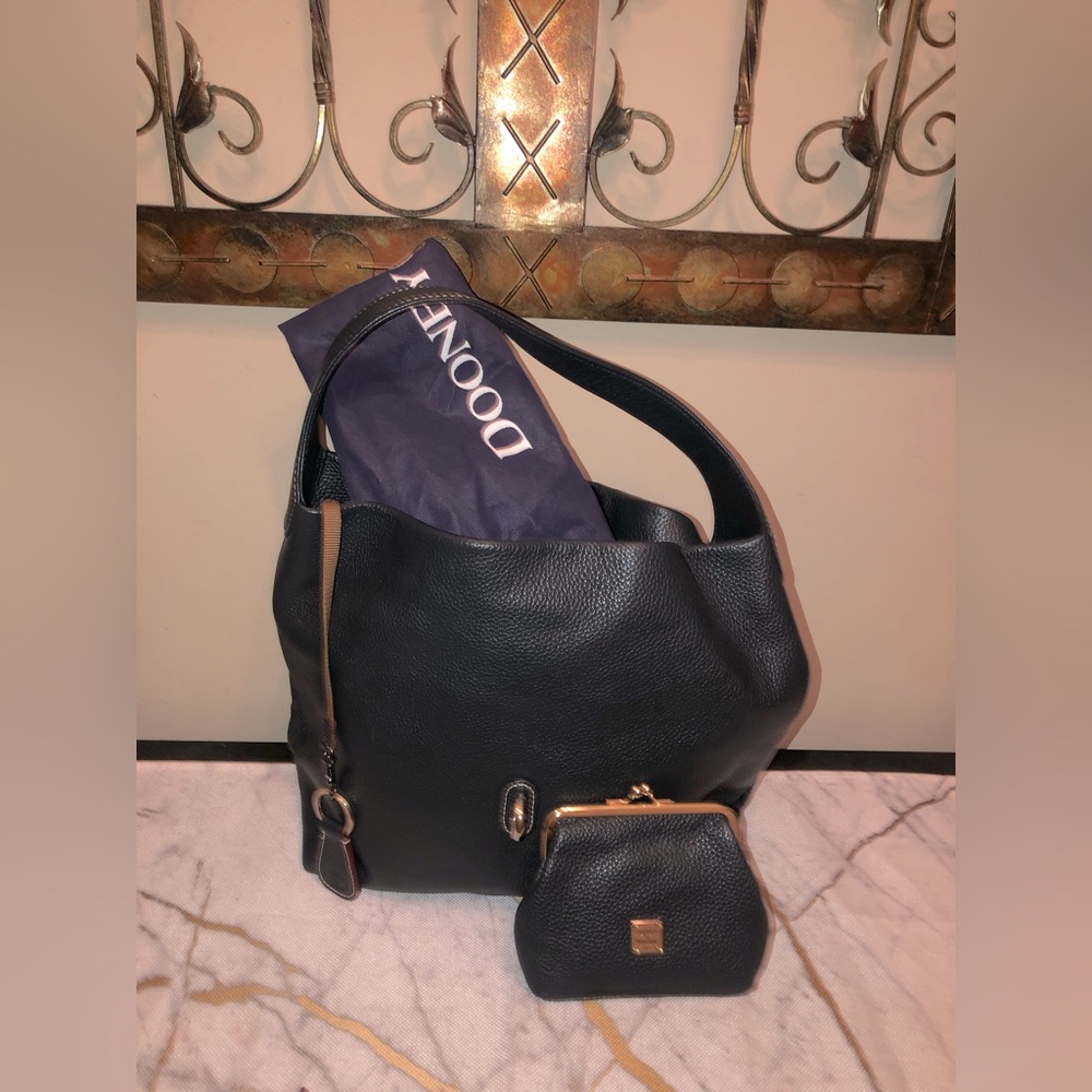 Dooney & Bourke navy blue handbag with coin wallet and dust cover; very cute